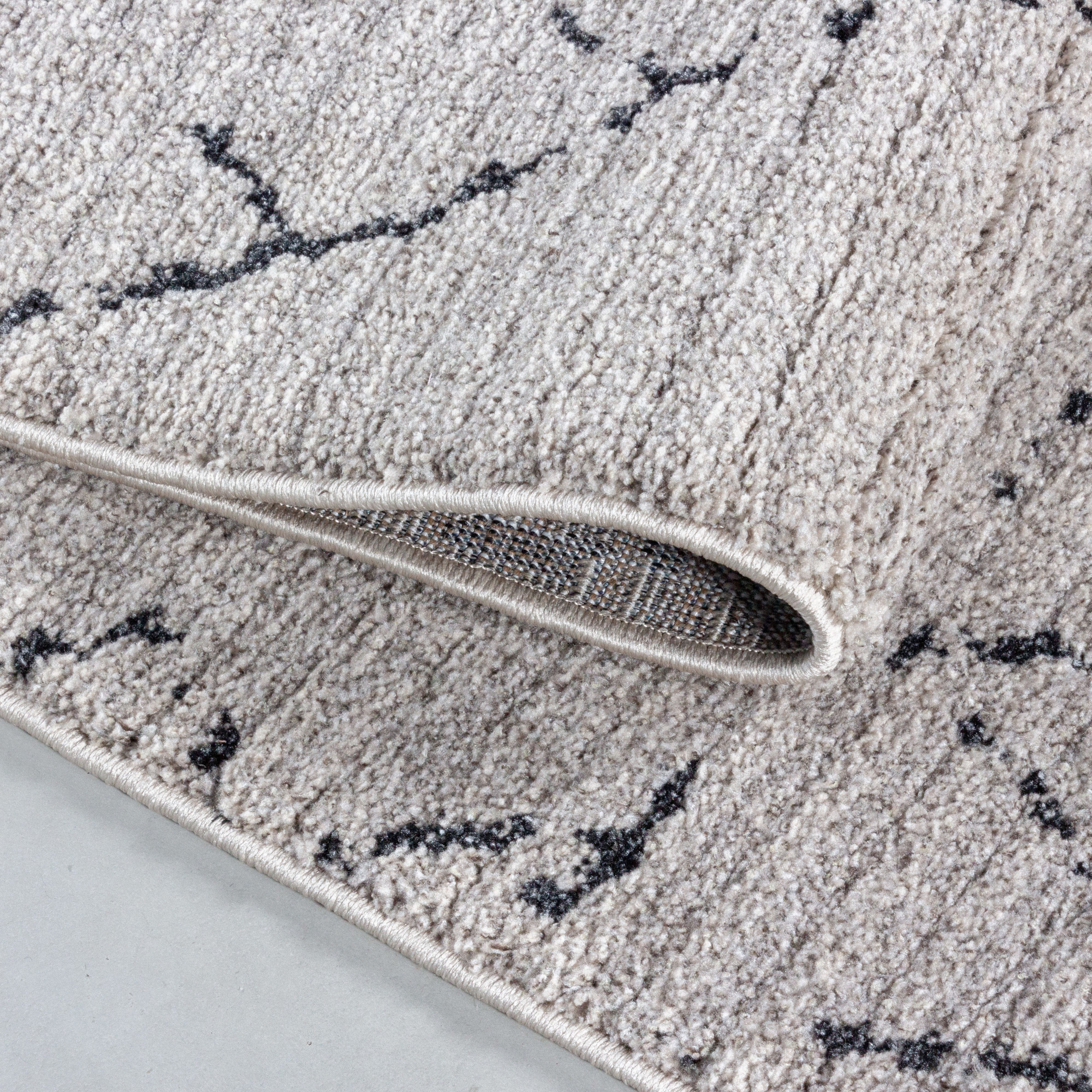 Kurzflor-Teppich im Berber-Design fürs Wohnzimmer