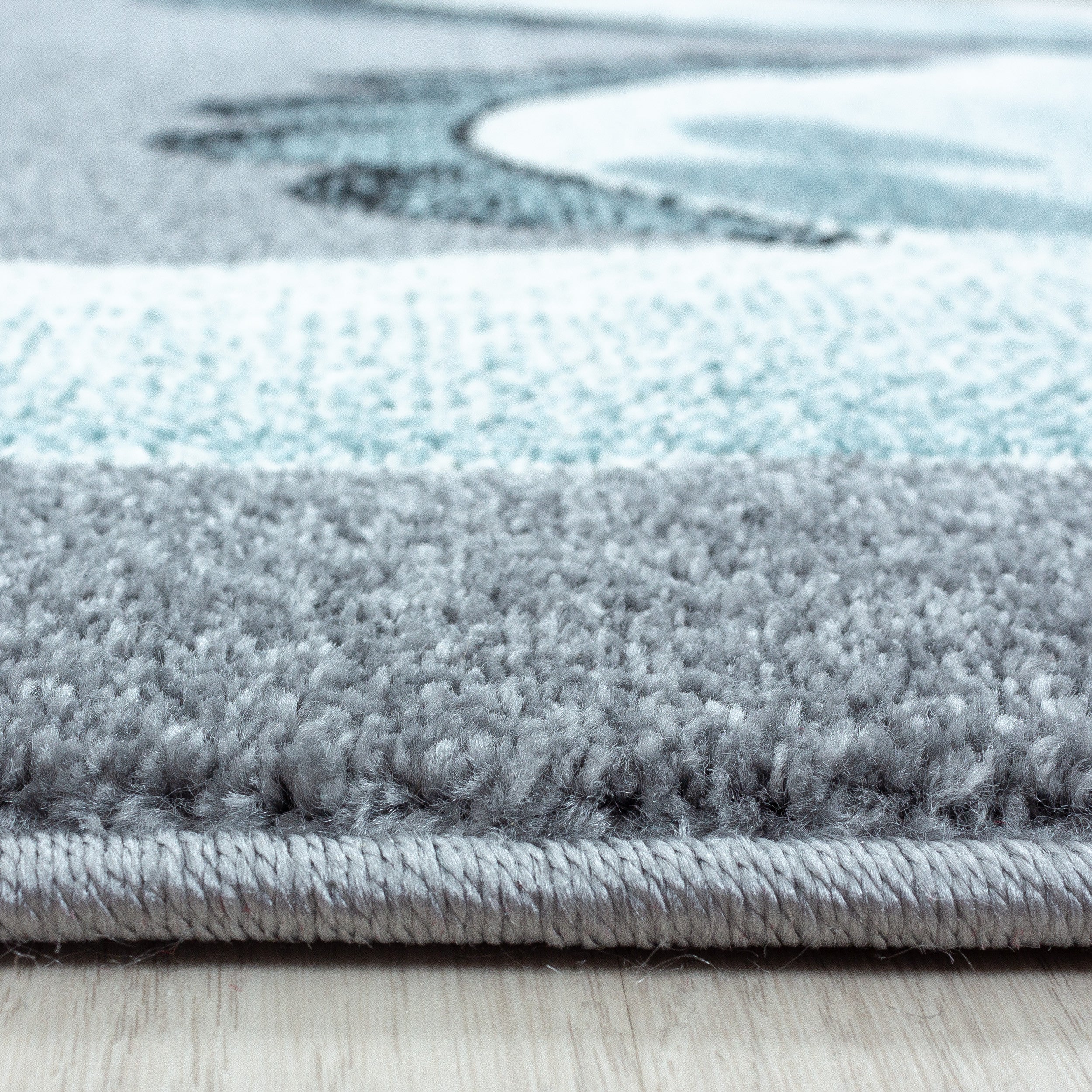 Kinder-Teppich blau im Dino Design auch in rund