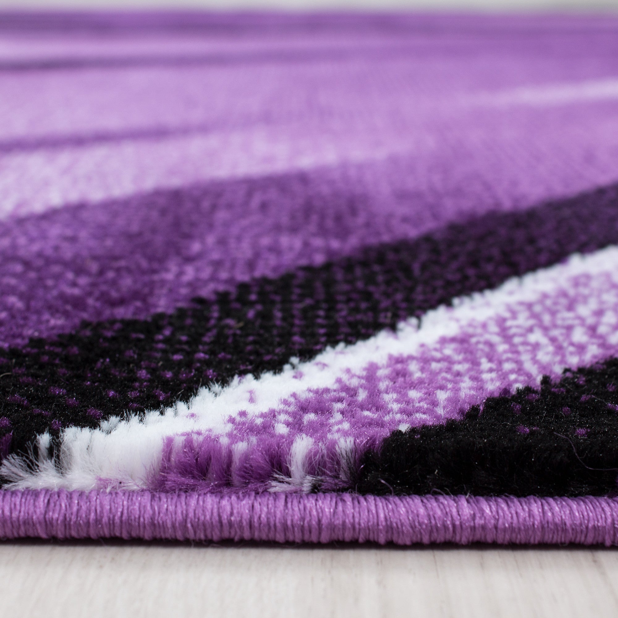 Kurzflor-Teppich in einzigartigem künstlerischem Wellen Design