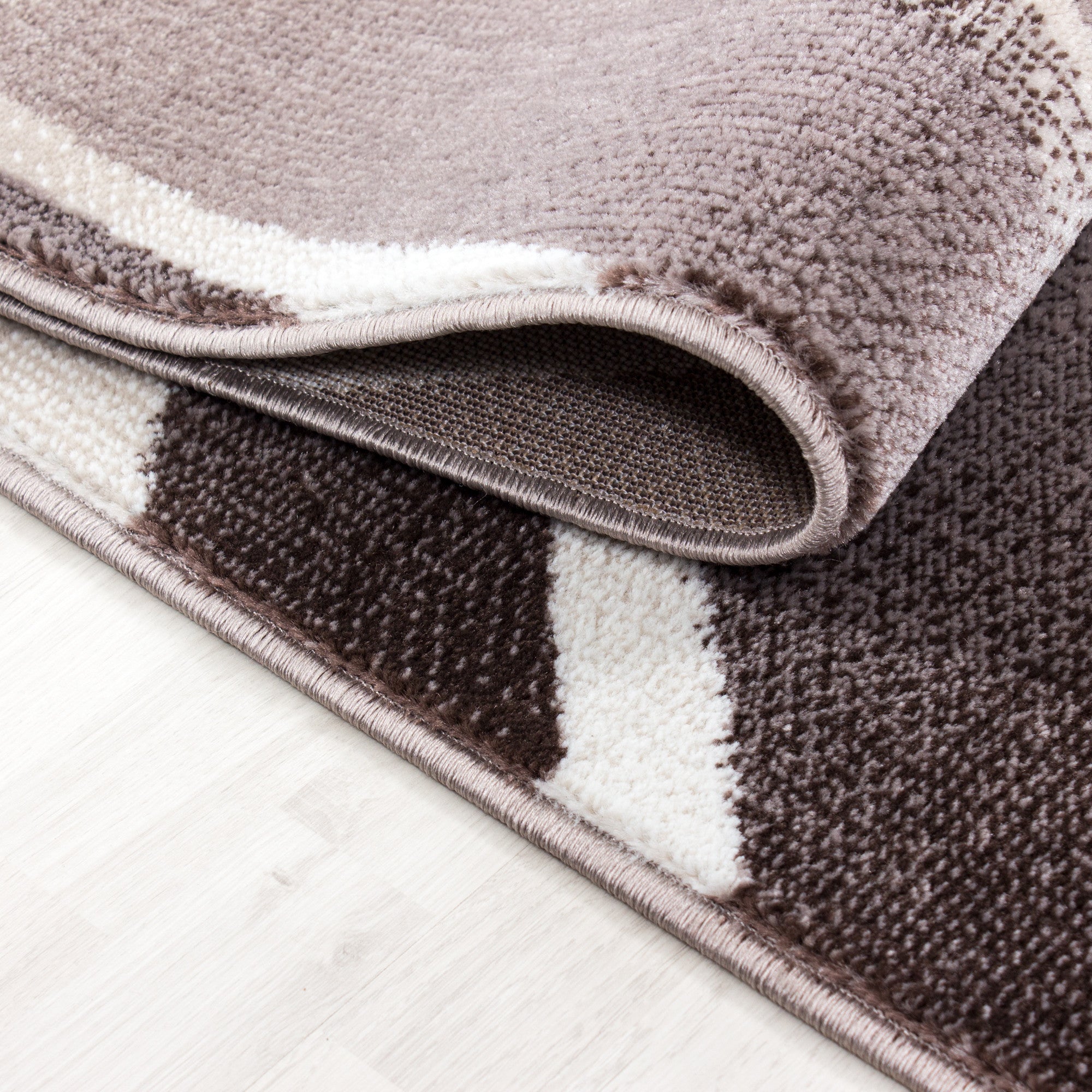 Kurzflor-Teppich in einzigartigem künstlerischem Wellen Design