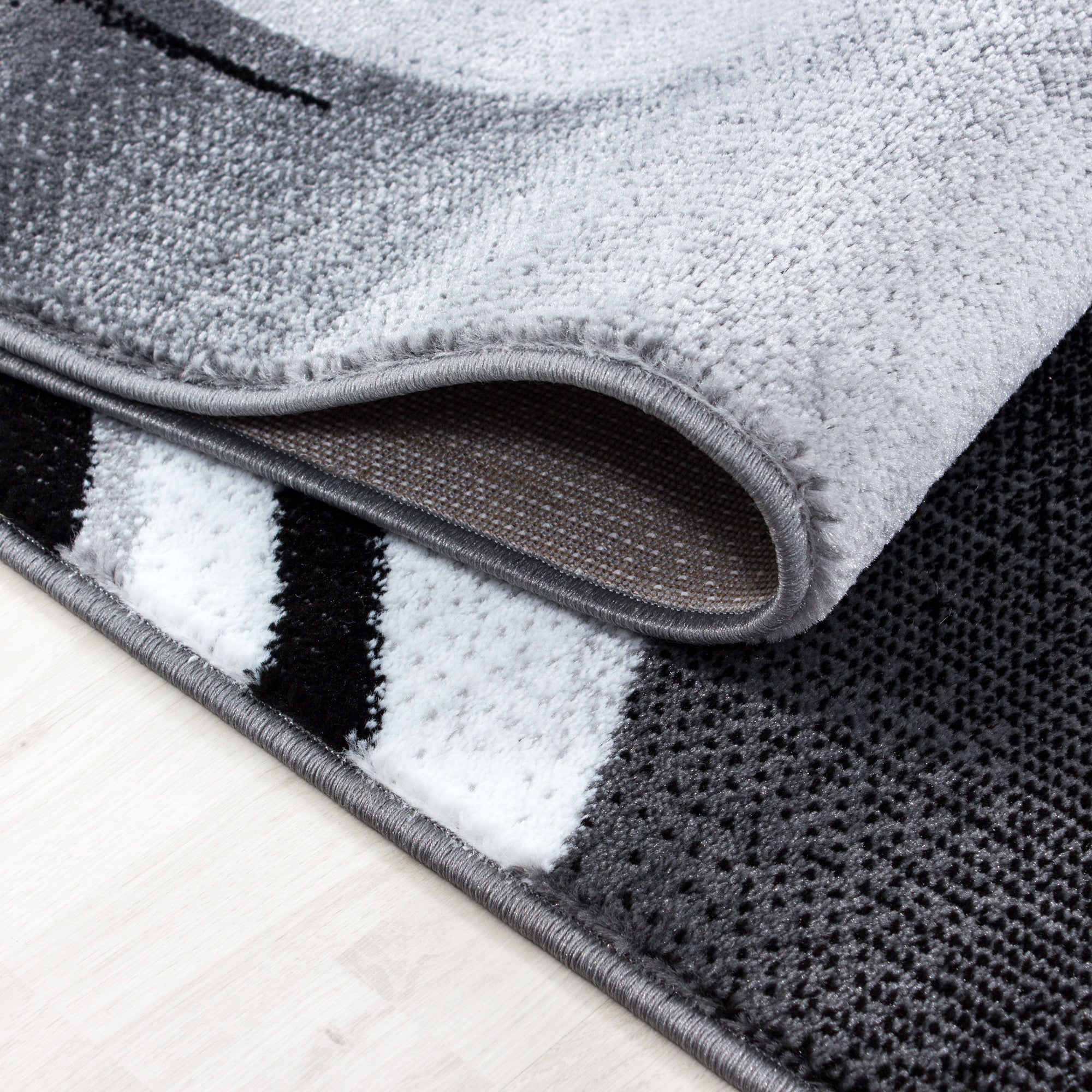 Kurzflor-Teppich in einzigartigem künstlerischem Wellen Design