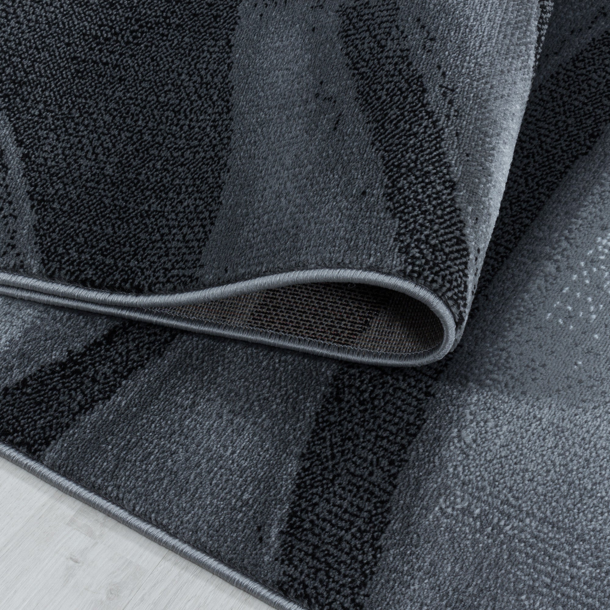 Kurzflor-Teppich im Wellen Design: elegant und gemütlich